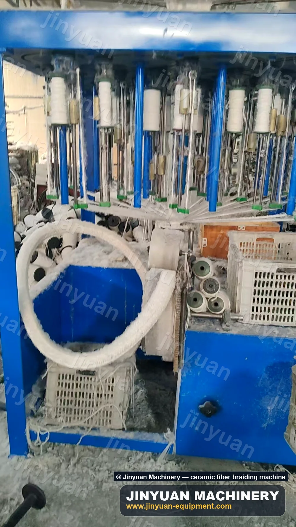 Braided ceramic fiber packing leaving the take-up of a braiding machine
